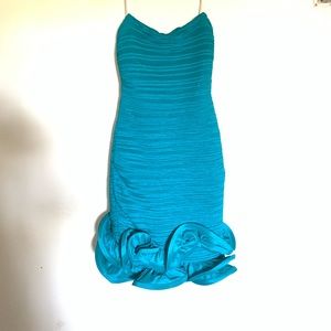 Strapless turquoise dress with ruffles
